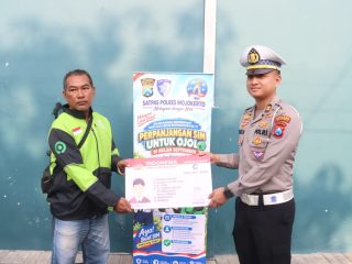 Sambut Hari Lalu Lintas Bhayangkara ke-71,Polres Mojokerto Berbagi Sembako Hingga SIM Gratis untuk Driver Ojol
